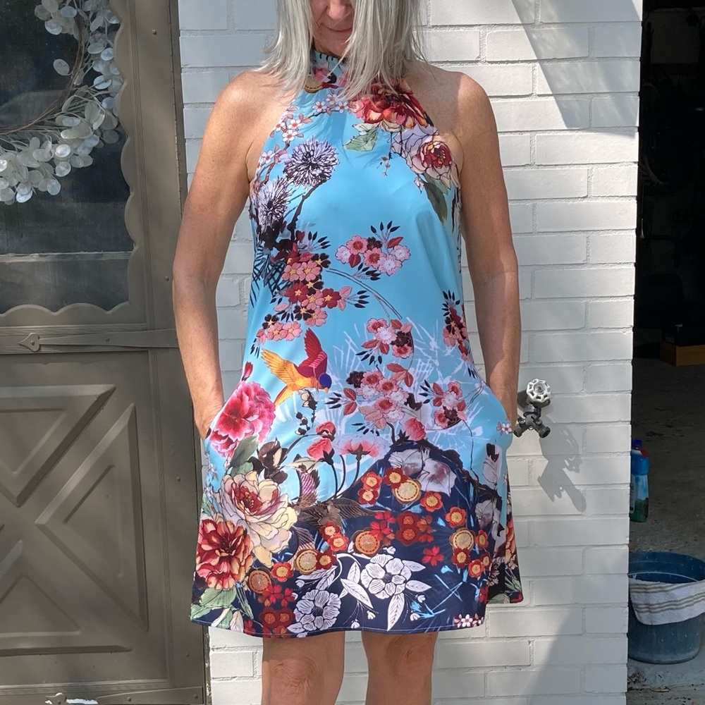 Nicole Miller Halter party/cocktail dress. Sleeveless floral design